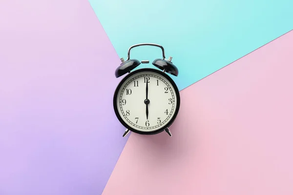 Alarm clock on color background — Stock Photo, Image