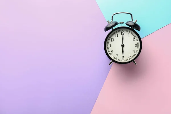 Alarm clock on color background — Stock Photo, Image