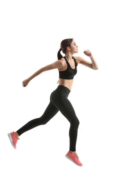 Sporty female runner on white background — Stock Photo, Image