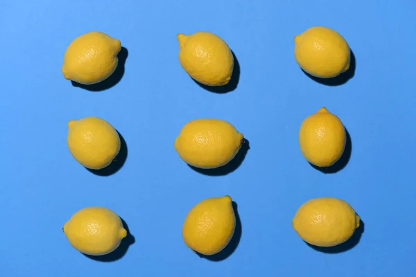 Ripe lemons on color background — Stock Photo, Image