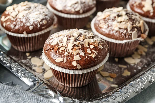 Tasty almond muffins on tray, closeup — Stock Photo, Image