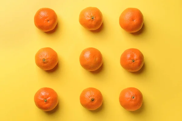 Tasty tangerines on color background — Stock Photo, Image