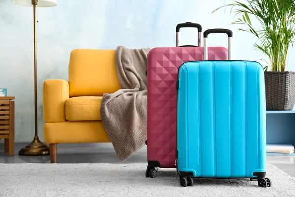 Packed suitcases in room. Travel concept