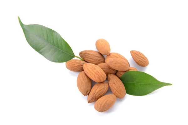 Tasty almonds on white background — Stock Photo, Image