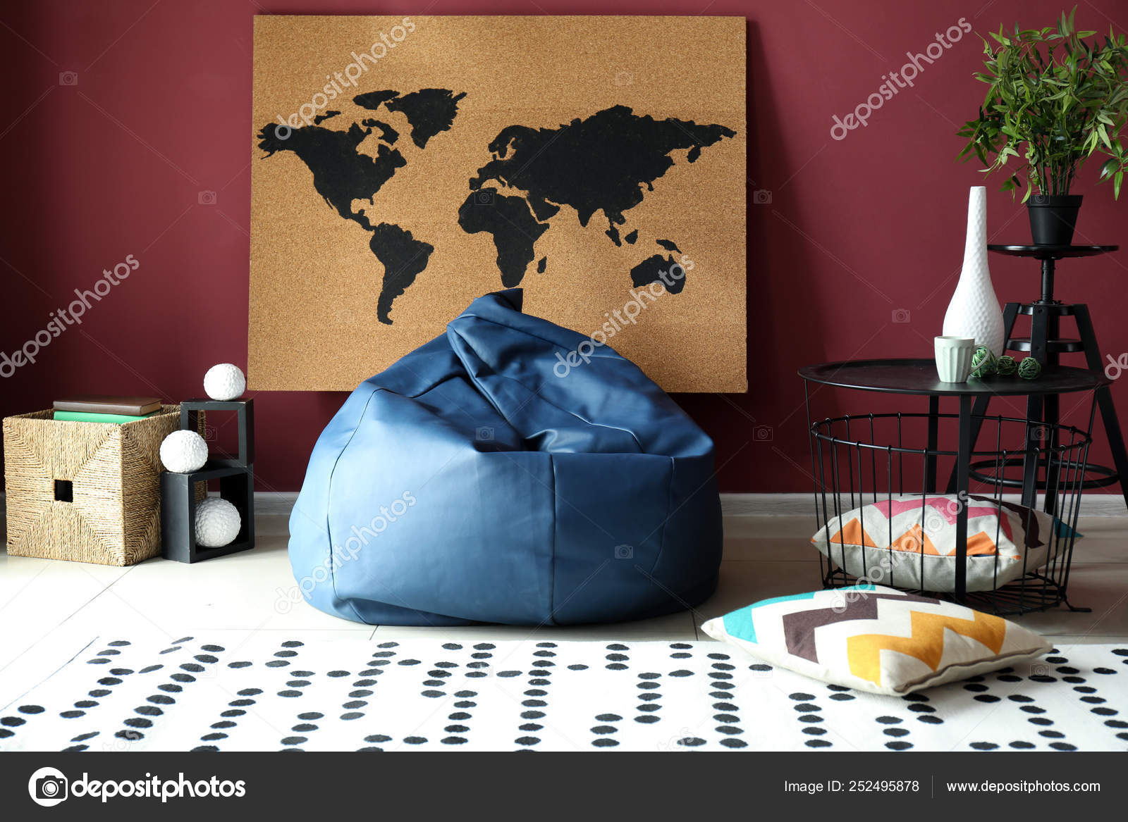 interior-of-modern-room-with-picture-of-world-map-on-wall-stock-photo