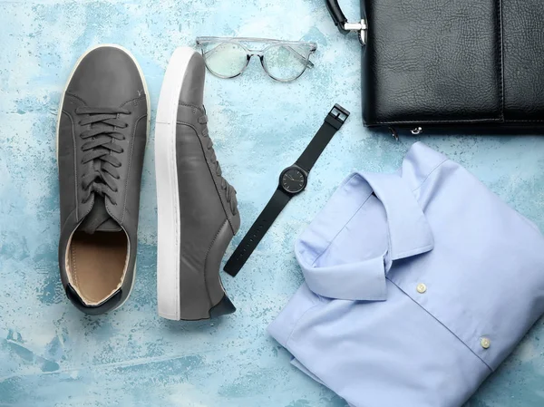 Set of male clothes and accessories on color background — Stock Photo, Image