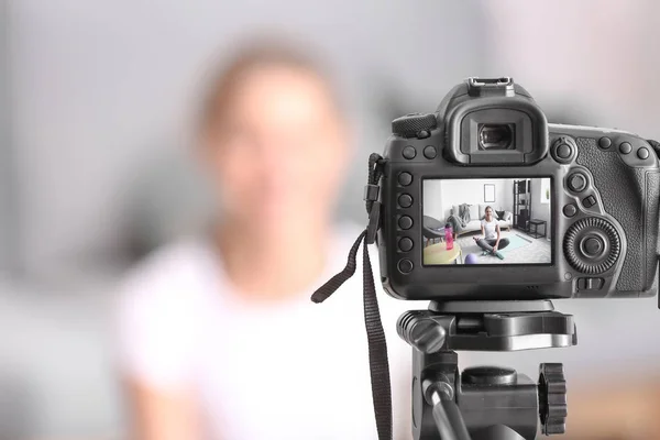 Young female blogger recording sports video at home — Stock Photo, Image