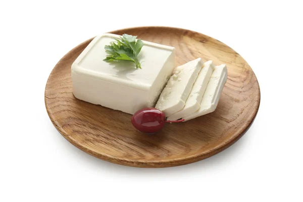 Placa con sabroso queso feta sobre fondo blanco —  Fotos de Stock
