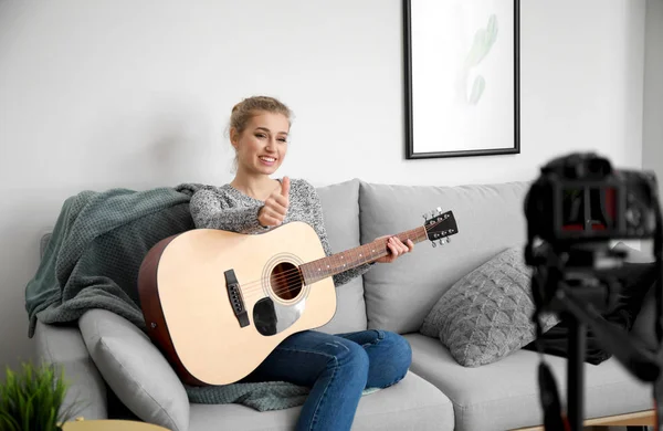 Young female musician recording video indoors — Stock Photo, Image