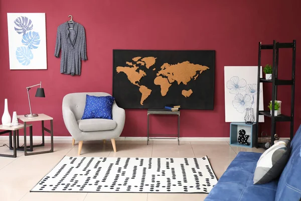 Interior of living room with picture of map on wall