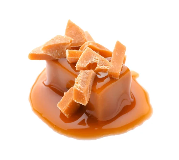 Chutné karamelové bonbóny na bílém pozadí — Stock fotografie