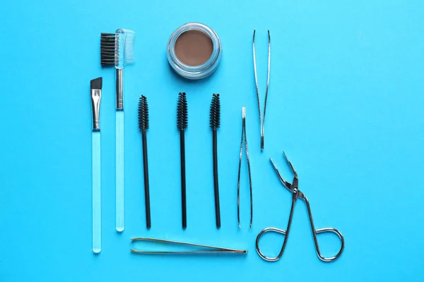 Set of tools for eyebrows correction on color background