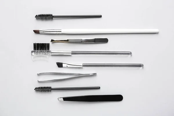 Set of tools for eyebrows correction on white background