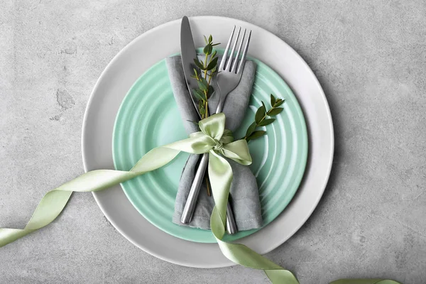 Beautiful Easter table setting on grey background — Stock Photo, Image