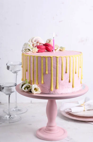 Tasty cake with burning candle on table — Stock Photo, Image