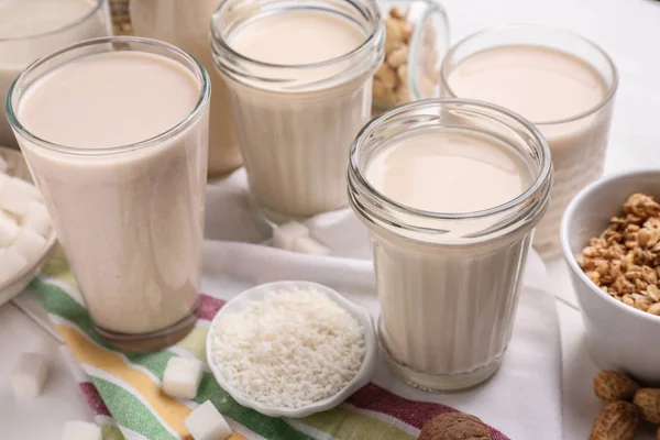 Tasty vegan milk on table — Stock Photo, Image