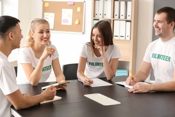 Team of young volunteers at meeting — Stock Photo, Image