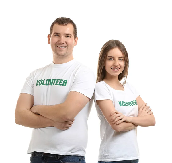 Young volunteers on white background — Stock Photo, Image