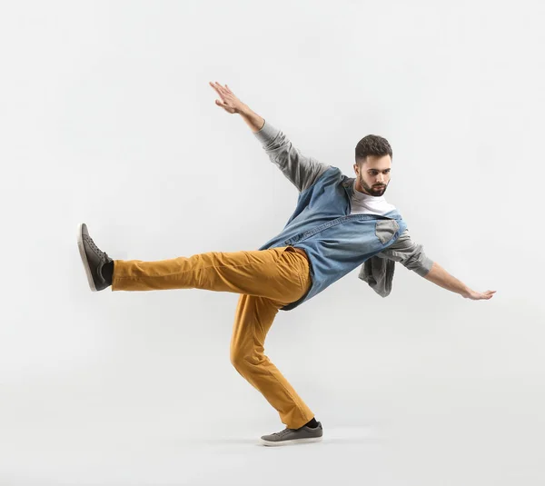 Fashionable young man on light background — Stock Photo, Image