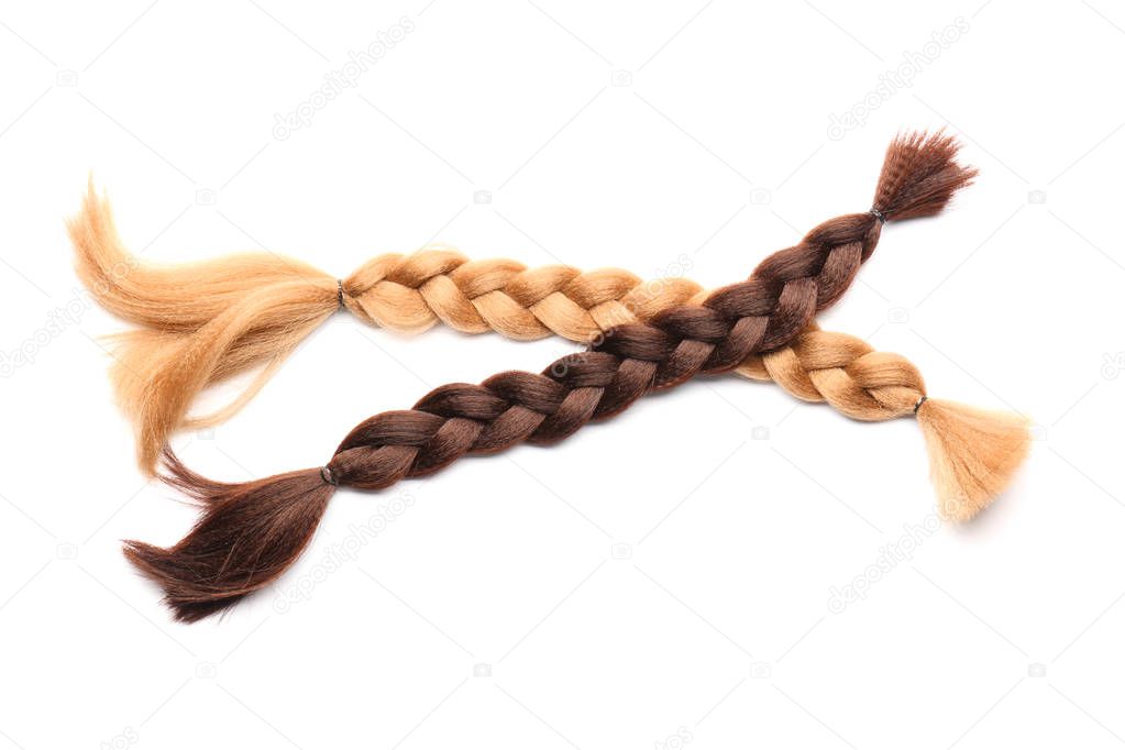 Braided strands on white background. Concept of hair donation
