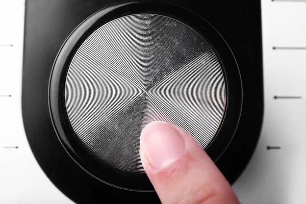 Female finger on regulator, closeup. Concept of starting new career — Stock Photo, Image