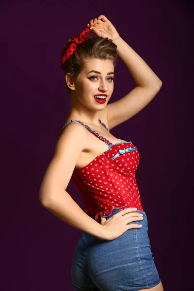 Beautiful pin-up woman on color background — Stock Photo, Image