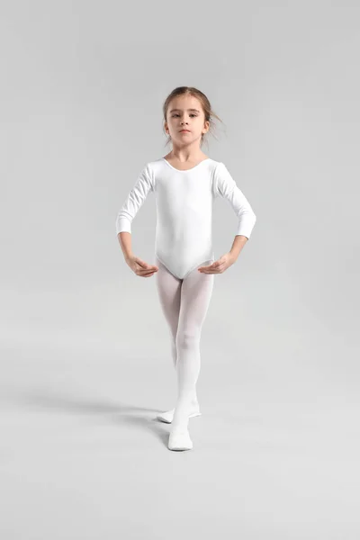 Cute little ballerina on light background — Stock Photo, Image