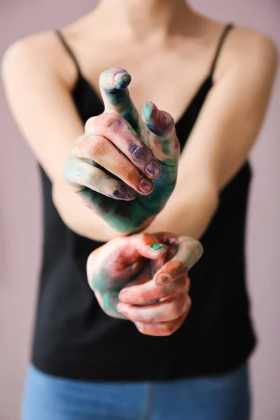 Young woman with painted hands, closeup — Stock Photo, Image