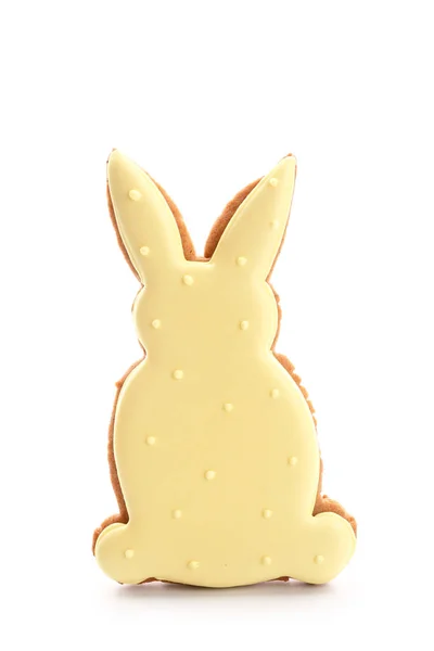 Biscoito saboroso da Páscoa em forma de coelho no fundo branco — Fotografia de Stock