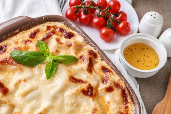 Tasty baked lasagna on table — Stock Photo, Image