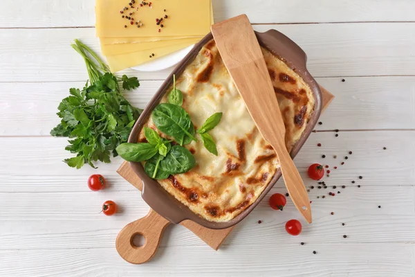 Tasty baked lasagna on white table — Stock Photo, Image