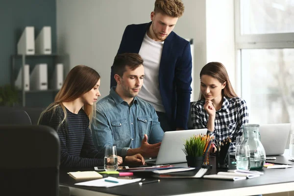 Young IT specialists working in modern office — Stock Photo, Image