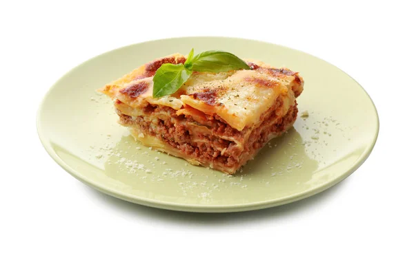 Plaat met lekkere gebakken lasagne op witte achtergrond — Stockfoto