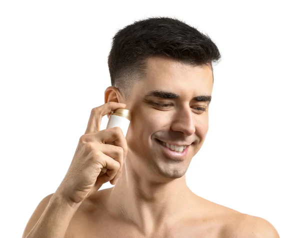 Stilig man med face serum på vit bakgrund — Stockfoto