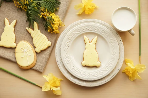 Tasty Easter cookies with milk on table — Stock Photo, Image