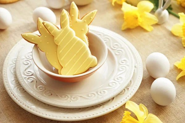 Plates with tasty Easter cookies on table — Stock Photo, Image