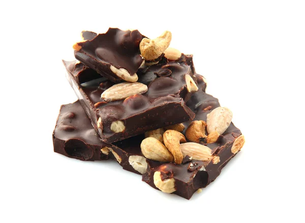 Tasty dark chocolate with nuts on white background — Stock Photo, Image
