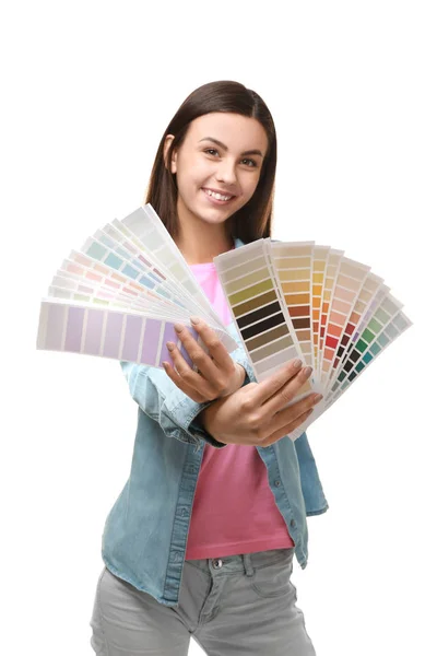 Female designer with color patterns on white background — Stock Photo, Image