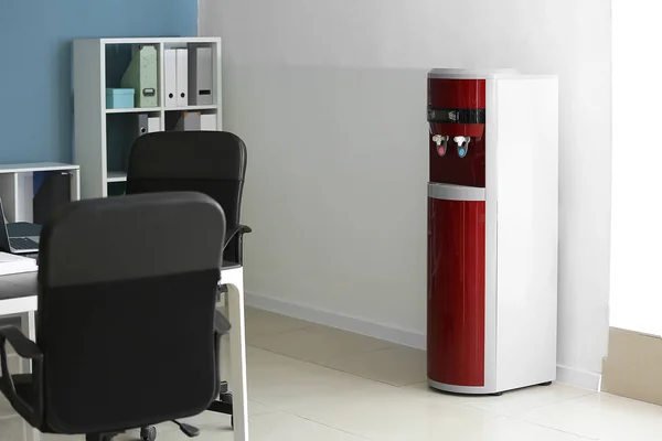 Modern water cooler in office