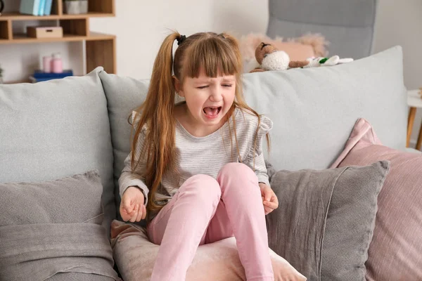 Portrait of crying little girl at home — Stock Photo, Image