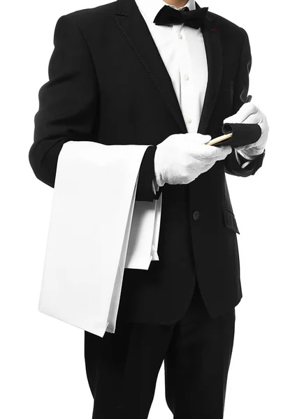 Camarero guapo con cuaderno sobre fondo blanco — Foto de Stock