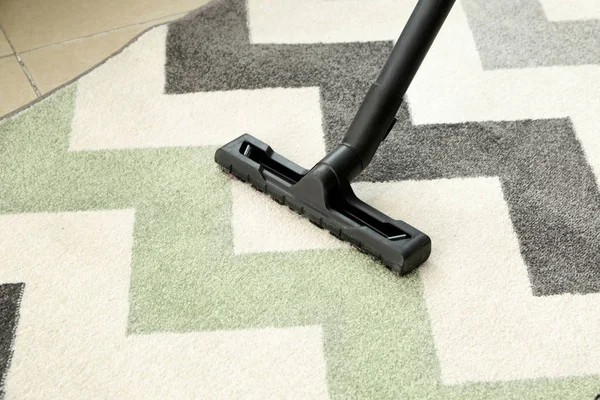 Brush of vacuum cleaner on carpet — Stock Photo, Image