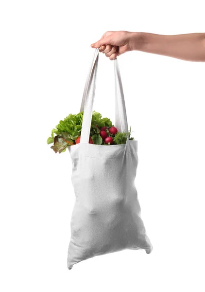 Női kezében eco bag termékeket fehér háttér — Stock Fotó