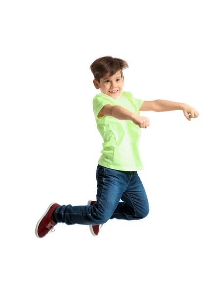 Χαριτωμένο μικρό αγόρι που πηδά σε λευκό φόντο — Φωτογραφία Αρχείου