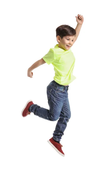 Cute little boy jumping against white background — Stock Photo, Image