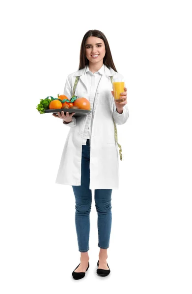 Portrait of female nutritionist with healthy products on white background — Stock Photo, Image