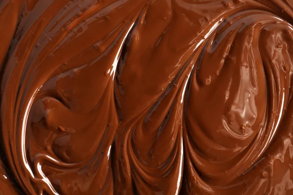 Textuur van gesmolten chocolade, close-up — Stockfoto