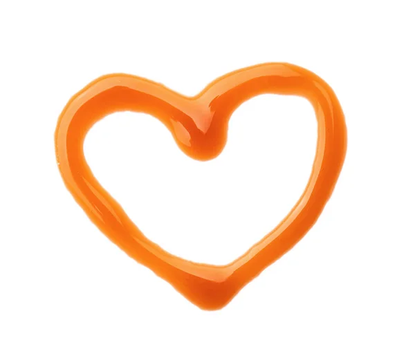 Heart made of liquid caramel on white background — Stock Photo, Image