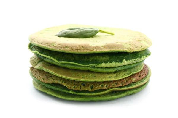 Tasty green pancakes on white background — Stock Photo, Image