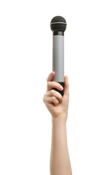 Mão feminina com microfone no fundo branco — Fotografia de Stock